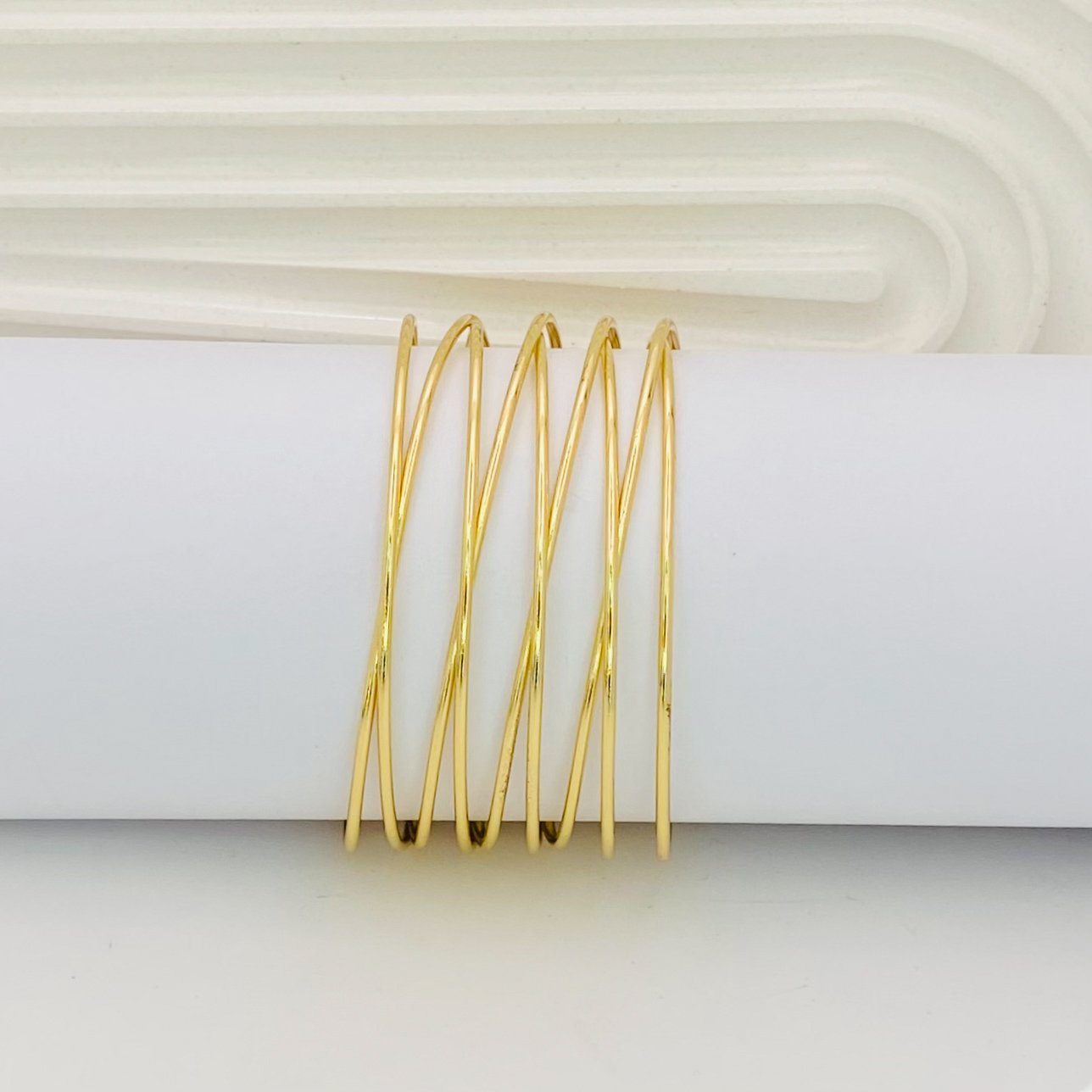 Bracelete linhas x dourado ref 3746