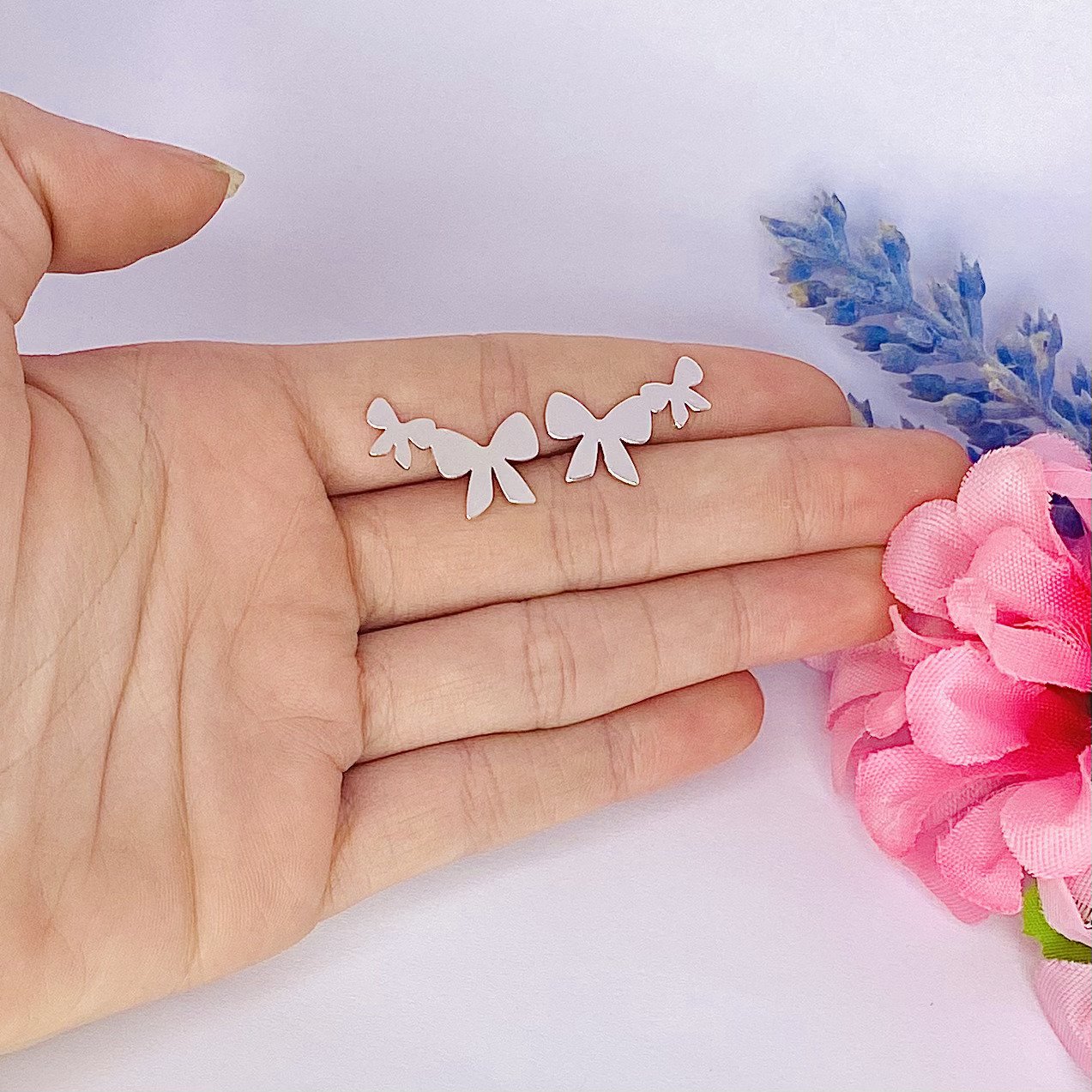 Brinco dois laços ref 2906