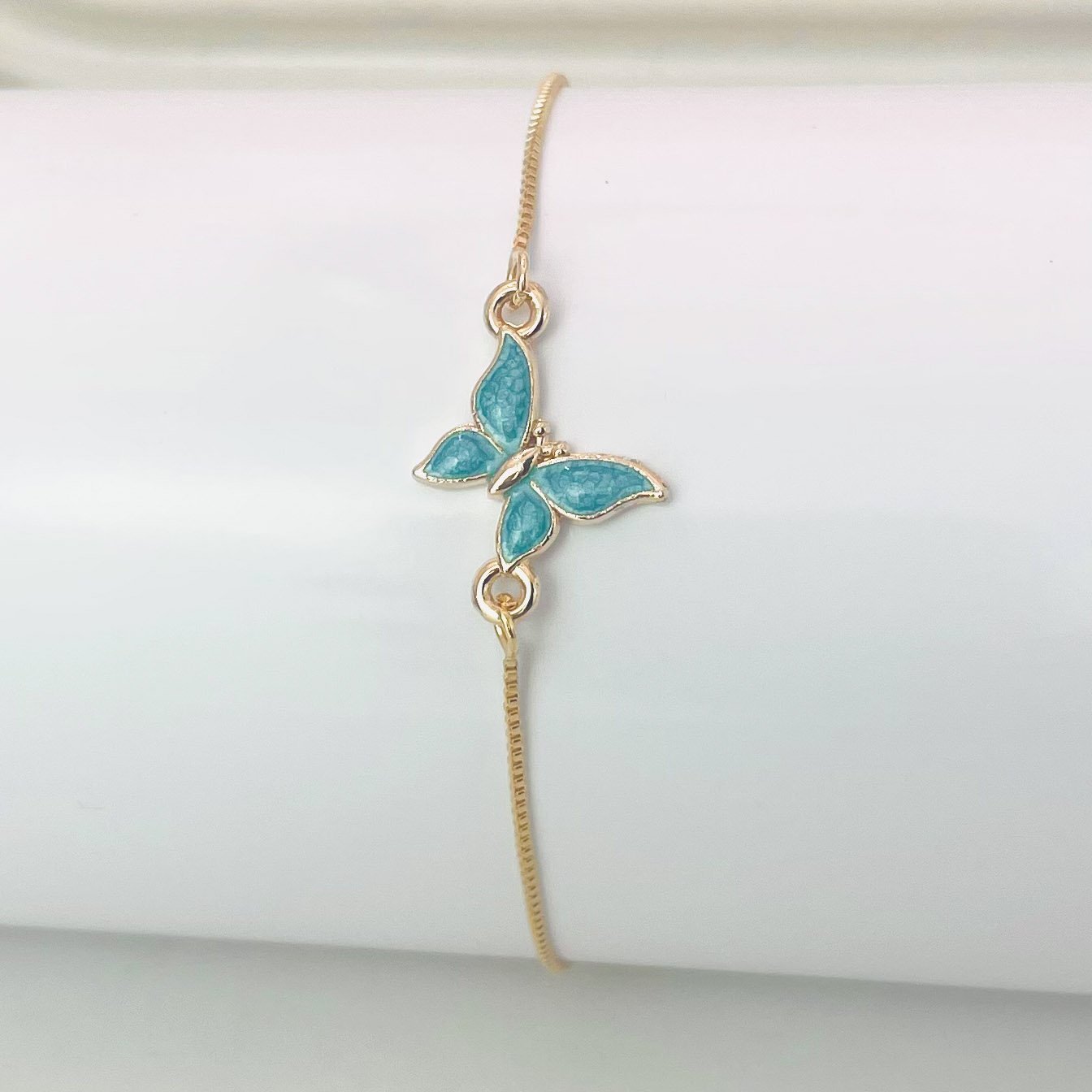 Pulseira borboleta azul dourado REF 4089