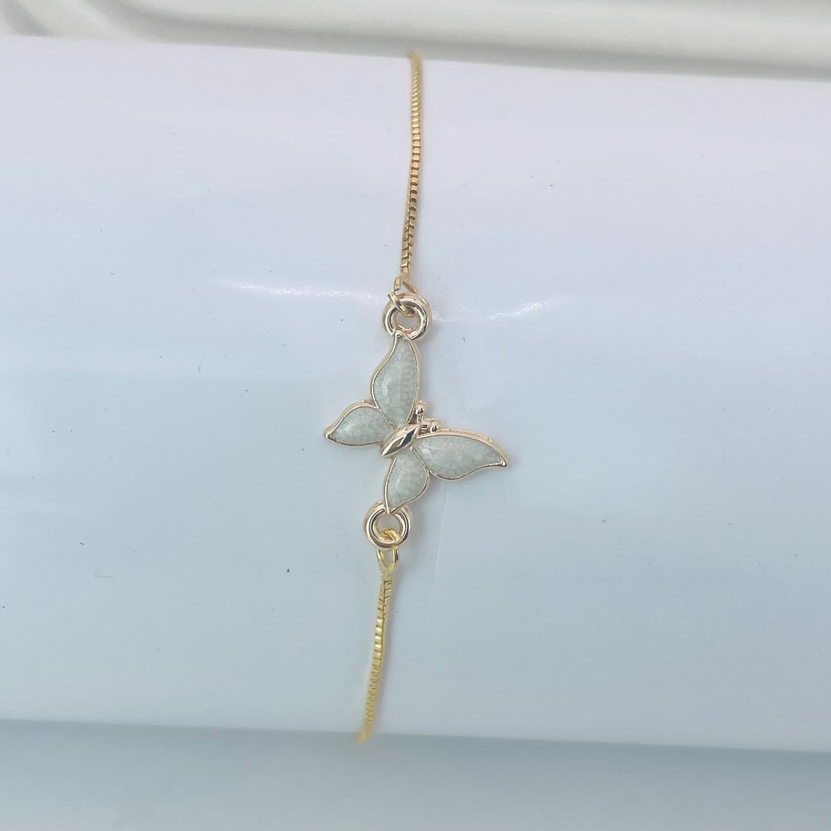 Pulseira borboleta cinza dourado REF 4095