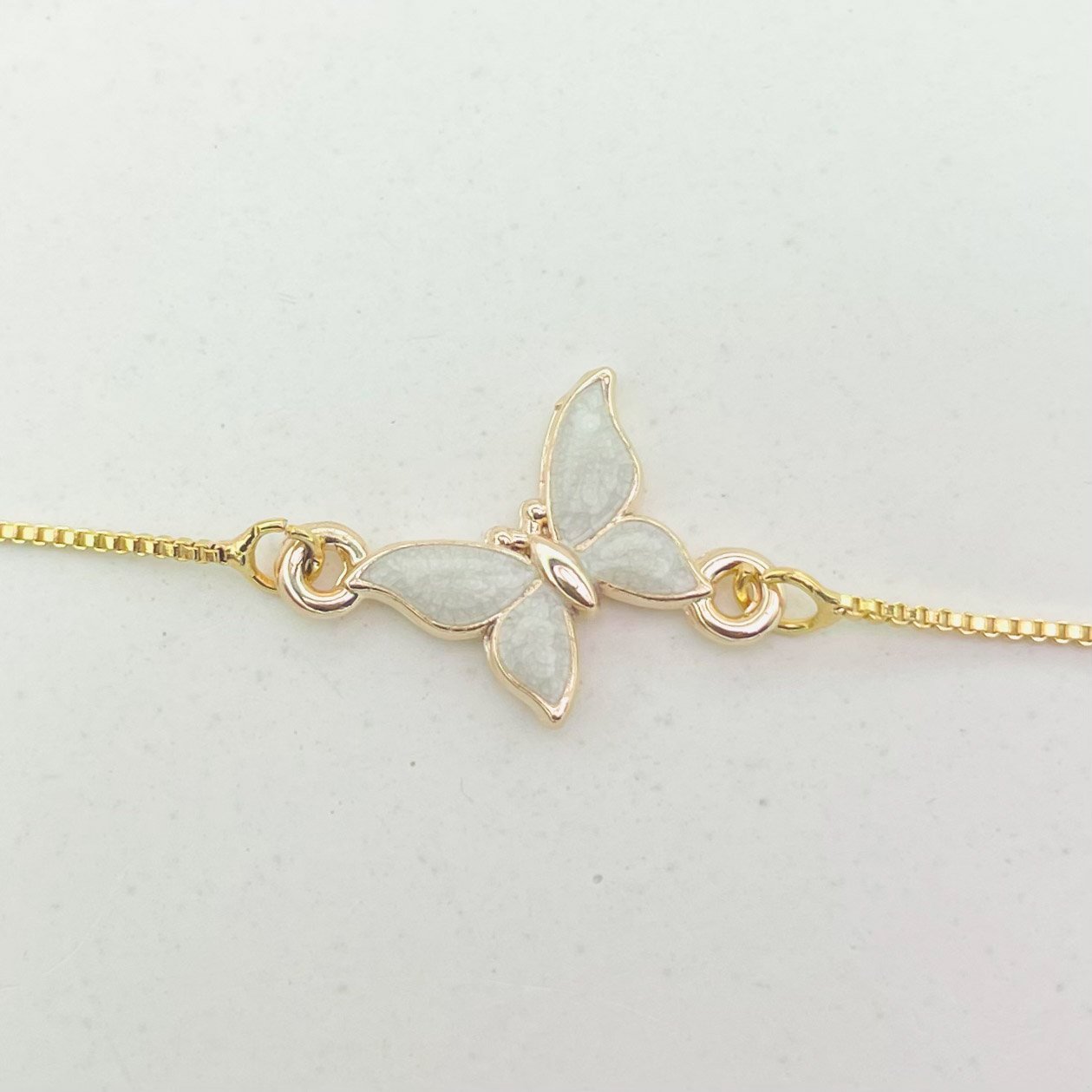 Pulseira borboleta cinza dourado REF 4095
