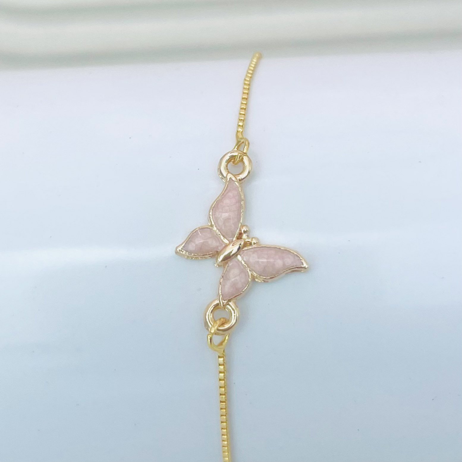 Pulseira borboleta rosa dourado REF 4093