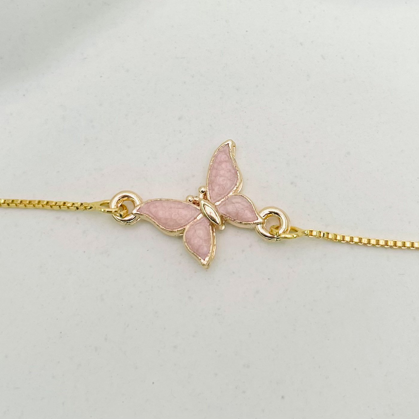 Pulseira borboleta rosa dourado REF 4093