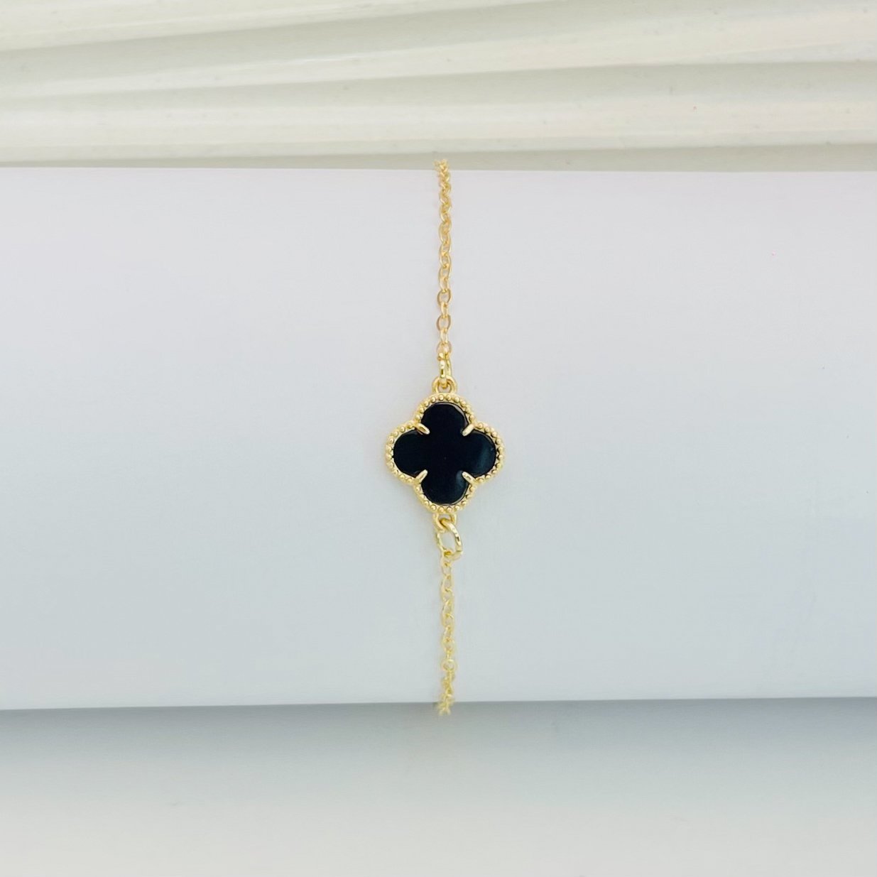 Pulseira virginia preta dourada ref 3973