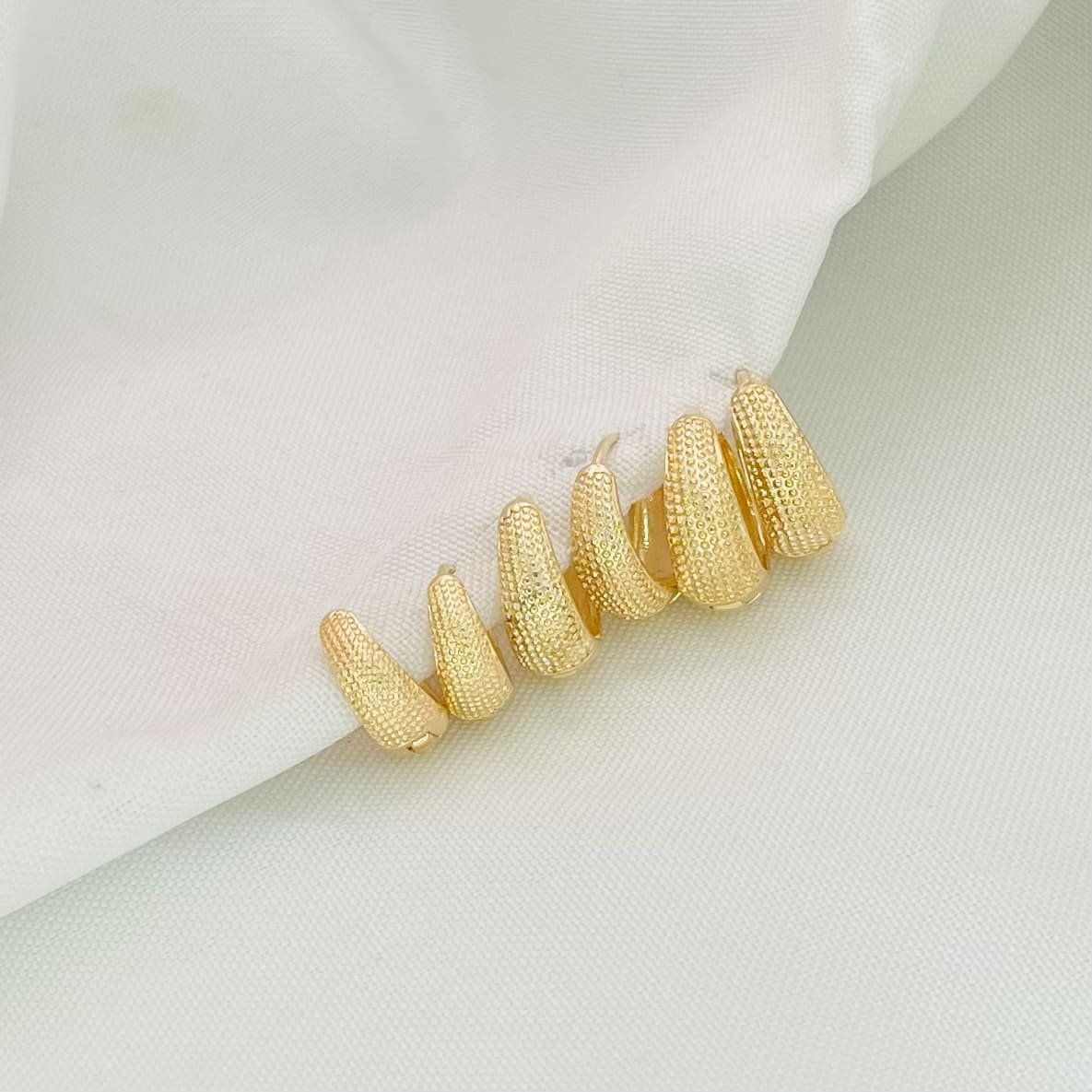 Trio argola texturizada dourado ref 3940